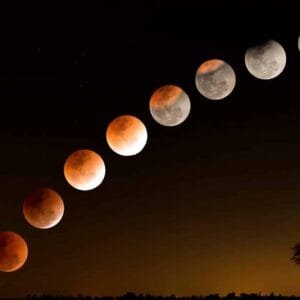 Blood Moon over Delhi skyline during total lunar eclipse on Sept 7, 2025